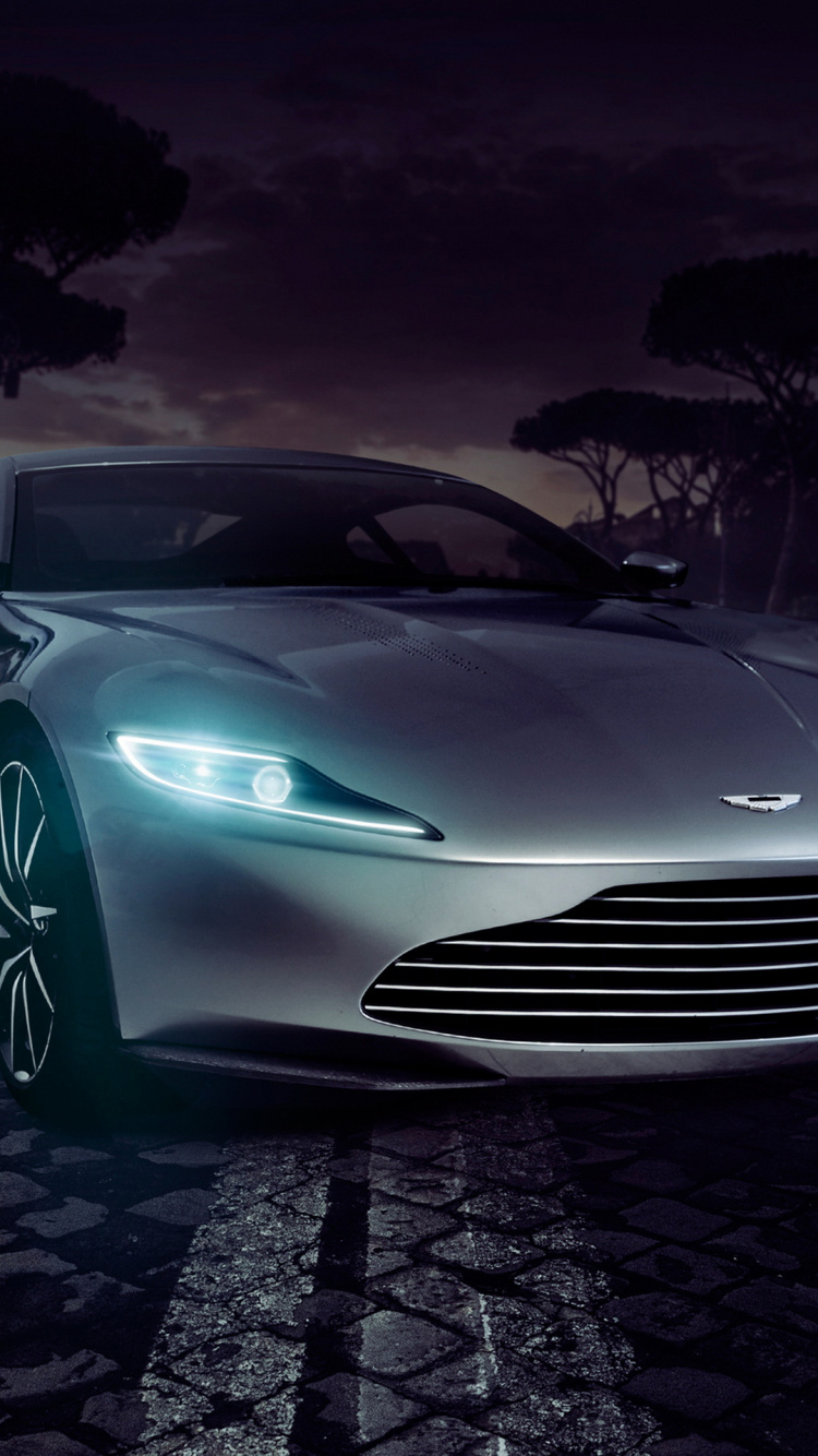 Porsche 911 Plateado Sobre Pavimento de Ladrillo Gris. Wallpaper in 750x1334 Resolution