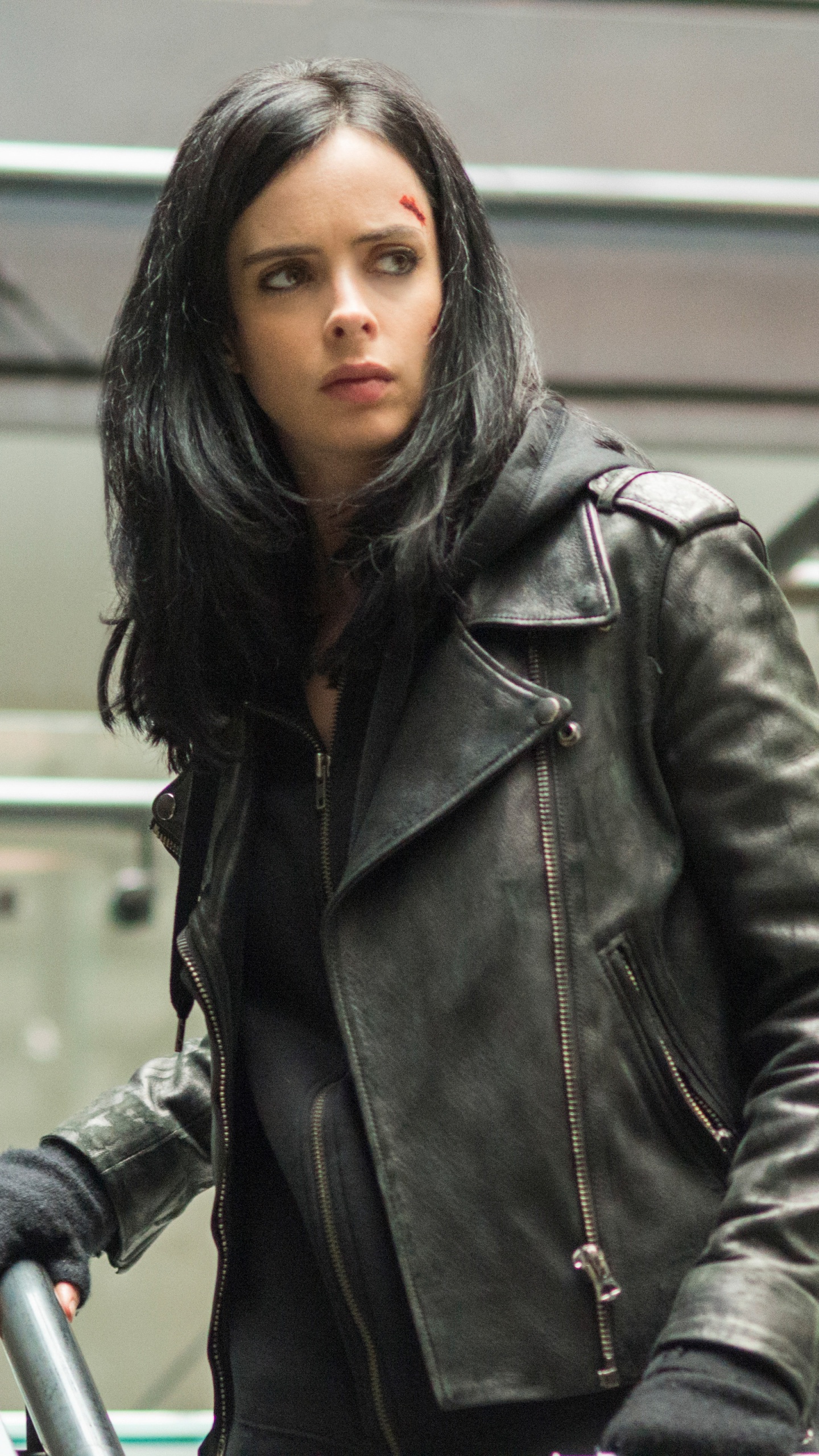 Woman in Black Leather Jacket Standing on Stairs. Wallpaper in 1440x2560 Resolution