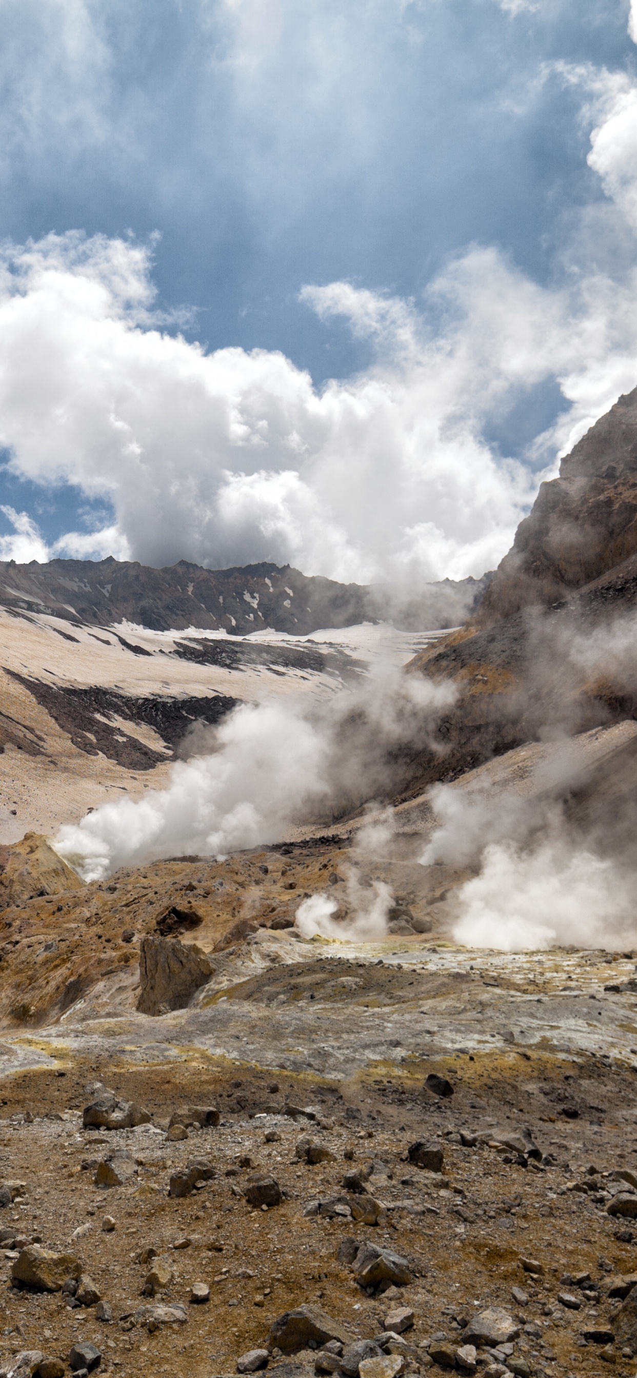 Brown and Gray Mountains Under White Clouds and Blue Sky During Daytime. Wallpaper in 1242x2688 Resolution