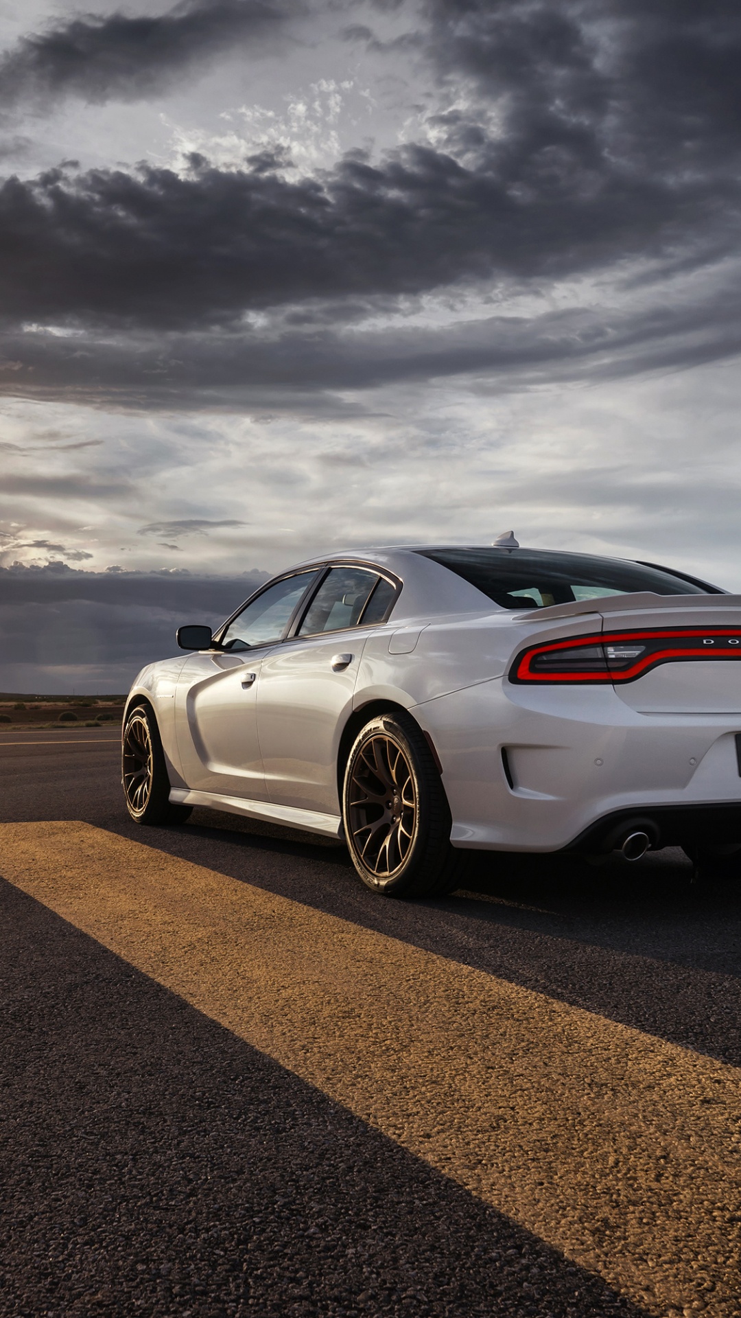 White Porsche 911 on Road Under Gray Clouds. Wallpaper in 1080x1920 Resolution