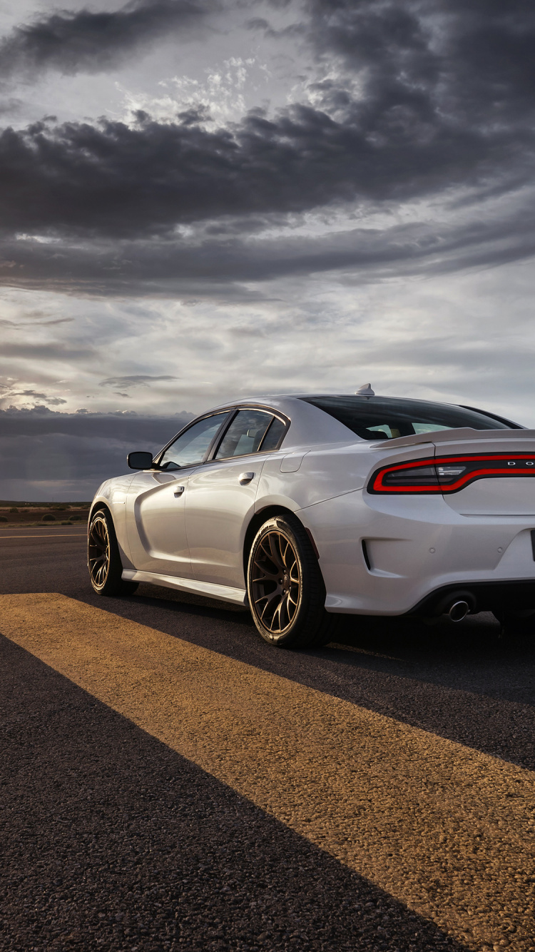 White Porsche 911 on Road Under Gray Clouds. Wallpaper in 750x1334 Resolution