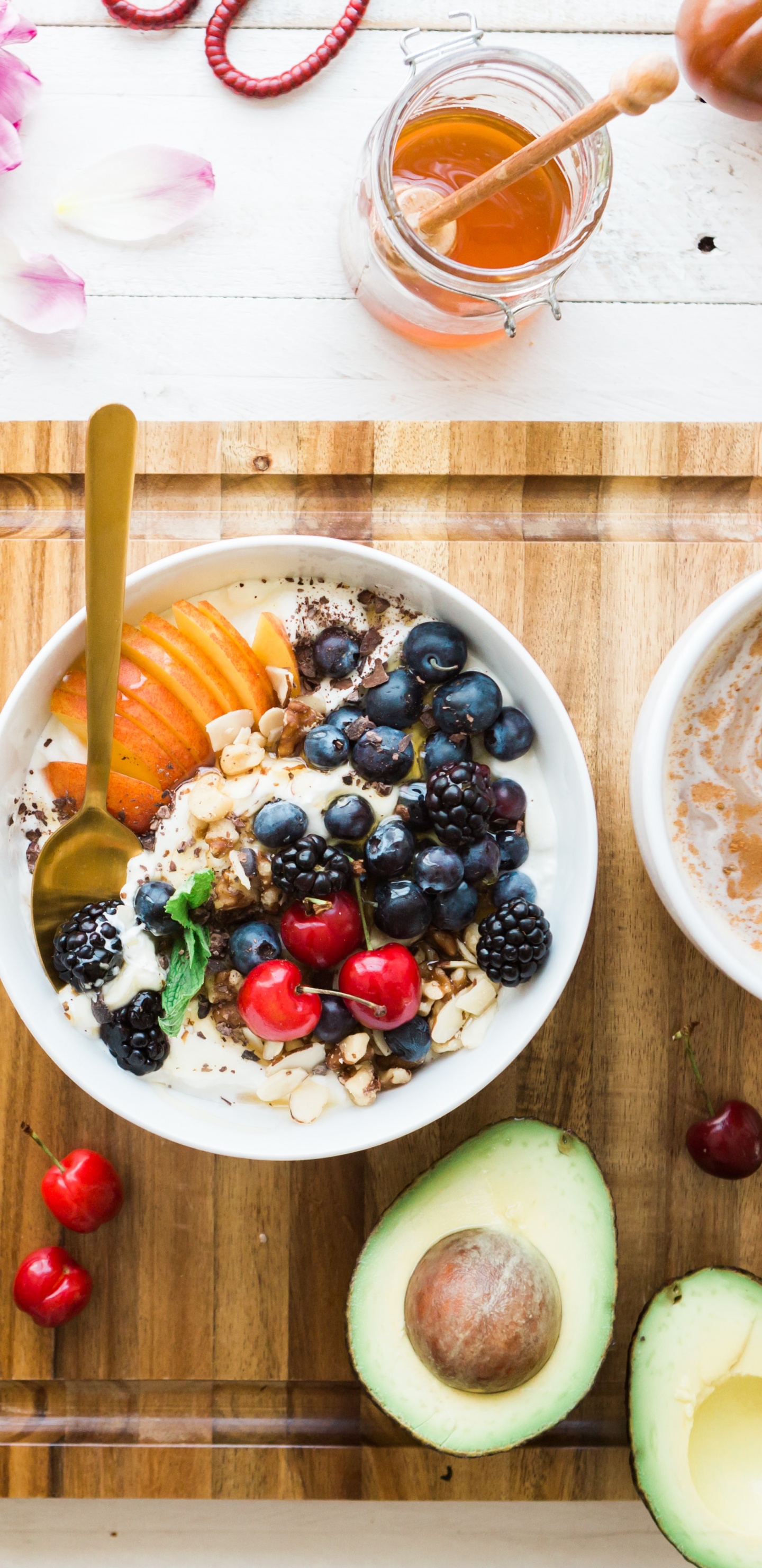 Sliced Fruits on White Ceramic Bowls. Wallpaper in 1440x2960 Resolution