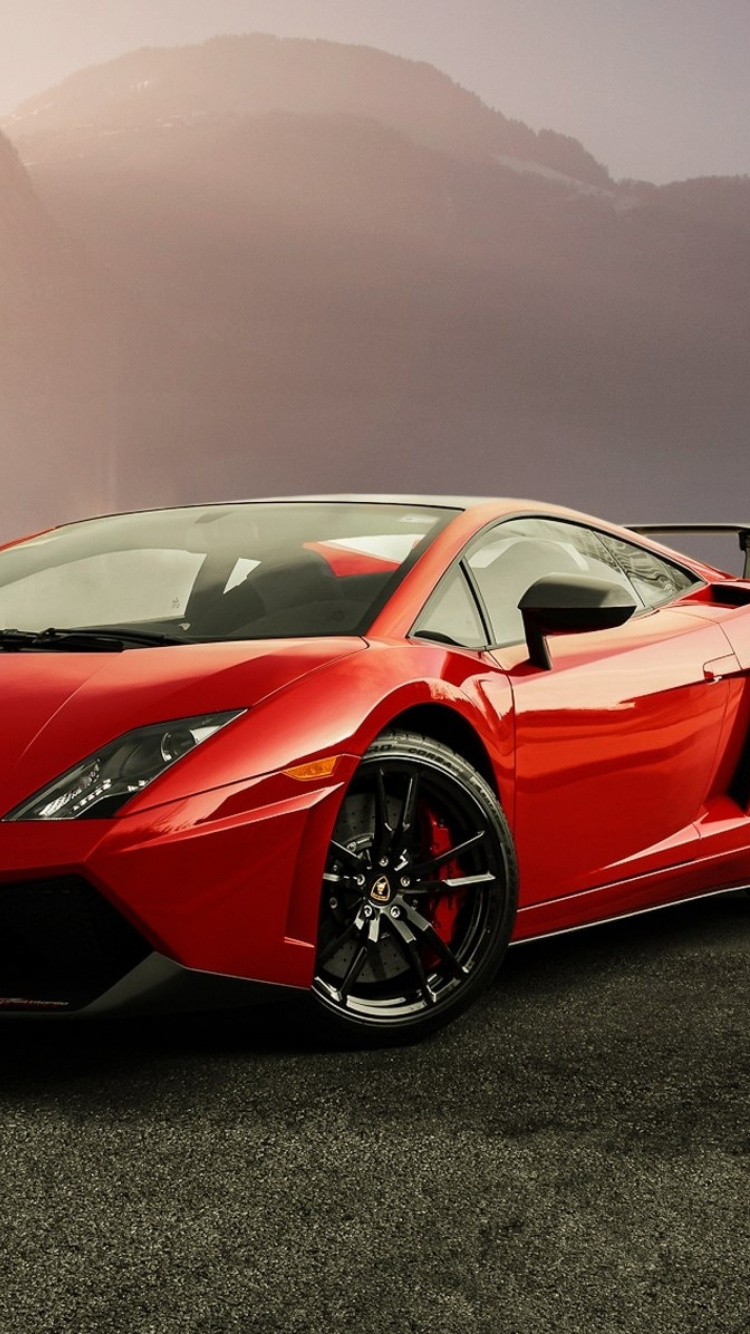 Roter Ferrari 458 Italia Auf Grauer Asphaltstraße. Wallpaper in 750x1334 Resolution