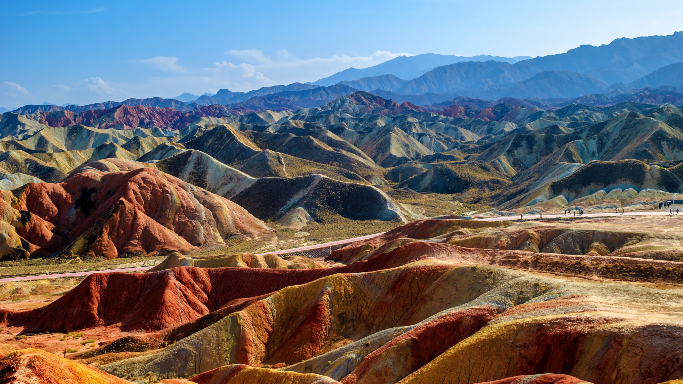 Brown and Gray Mountains Under Blue Sky During Daytime. Wallpaper in 1366x768 Resolution