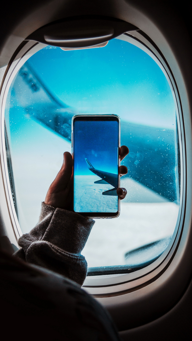 Download 750x1334 Wallpaper Airplane, Flight, Automotive Lighting, Window, Azure Airplane, Flight, Automotive Lighting, Window, Azure. Wallpaper in 750x1334 Resolution
