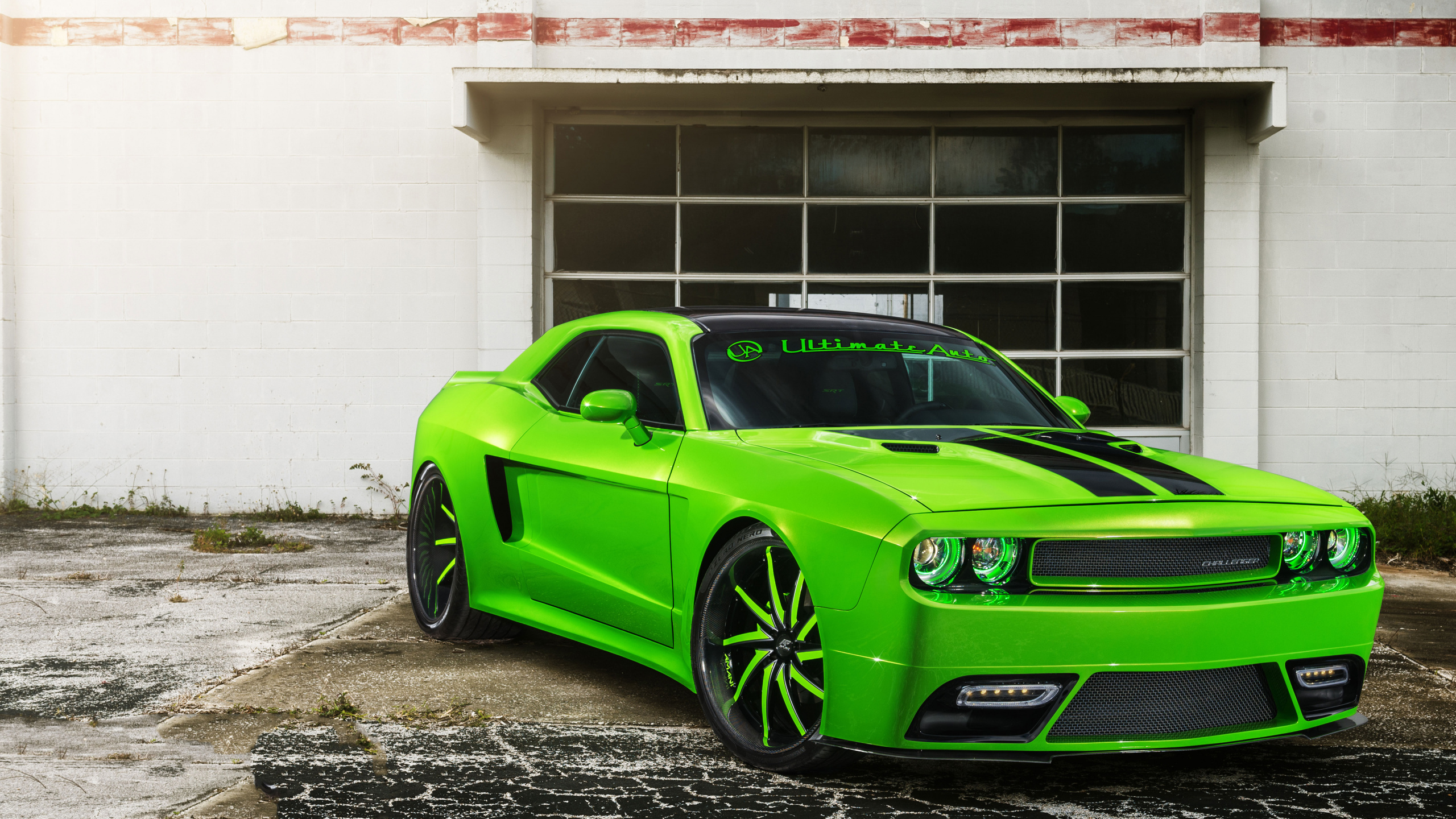 Green Chevrolet Camaro Parked Beside White Concrete Building During Daytime. Wallpaper in 2560x1440 Resolution