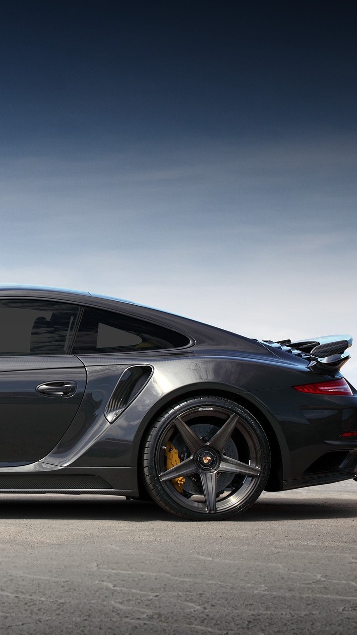 Porsche 911 Negro Sobre Pavimento Gris. Wallpaper in 720x1280 Resolution