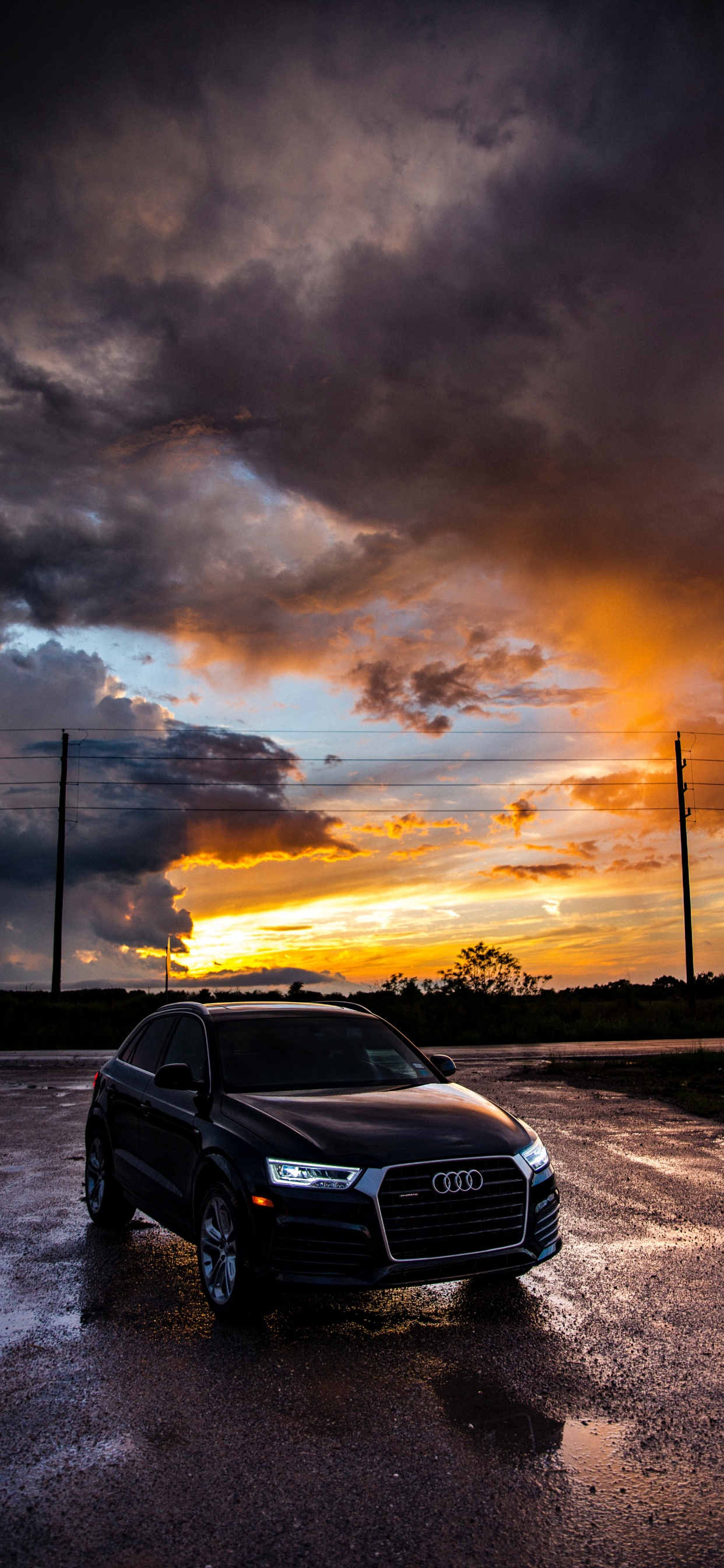 Black Audi a 4 on Road During Sunset. Wallpaper in 1242x2688 Resolution