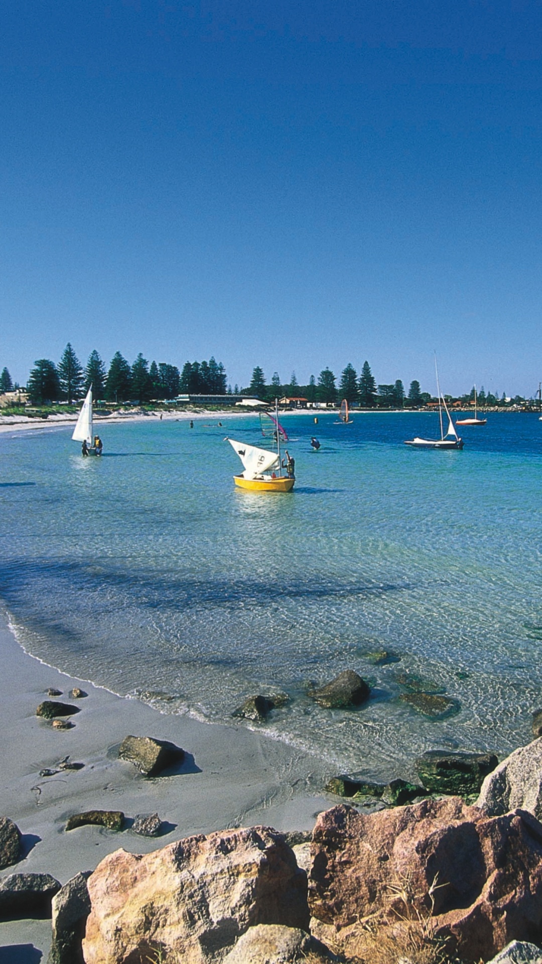 White Sail Boat on Sea Shore During Daytime. Wallpaper in 1080x1920 Resolution