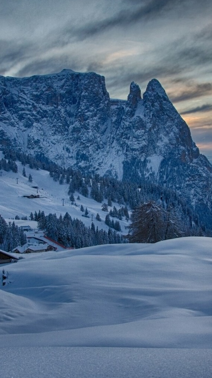 Snow Covered Mountain Under Cloudy Sky During Daytime. Wallpaper in 720x1280 Resolution