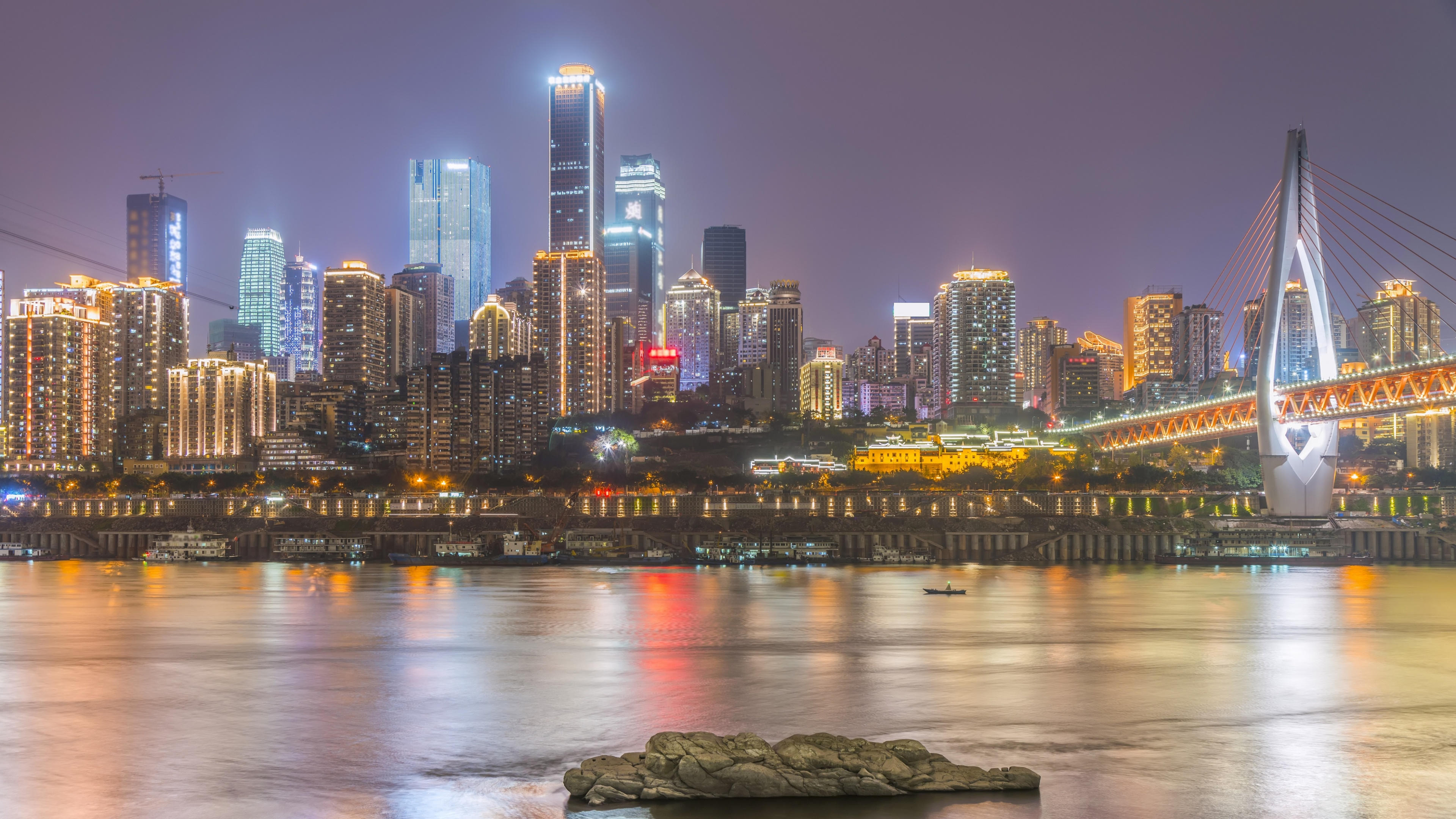 City Skyline Across Body of Water During Night Time. Wallpaper in 3840x2160 Resolution