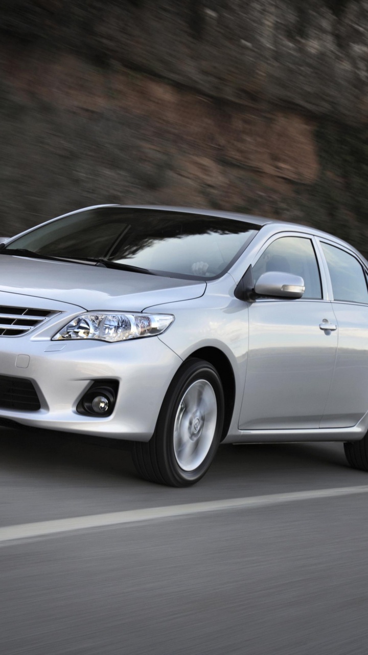 Silver Mercedes Benz Coupe on Road. Wallpaper in 720x1280 Resolution