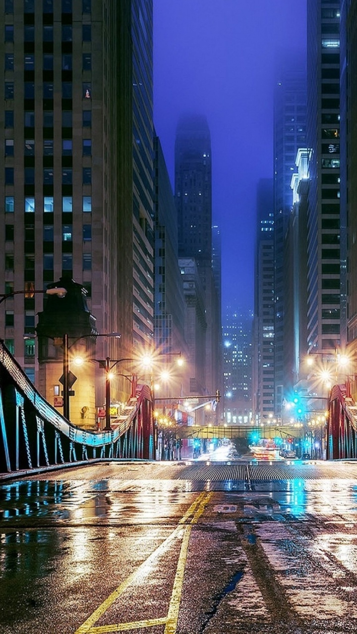 People Walking on Bridge During Night Time. Wallpaper in 720x1280 Resolution