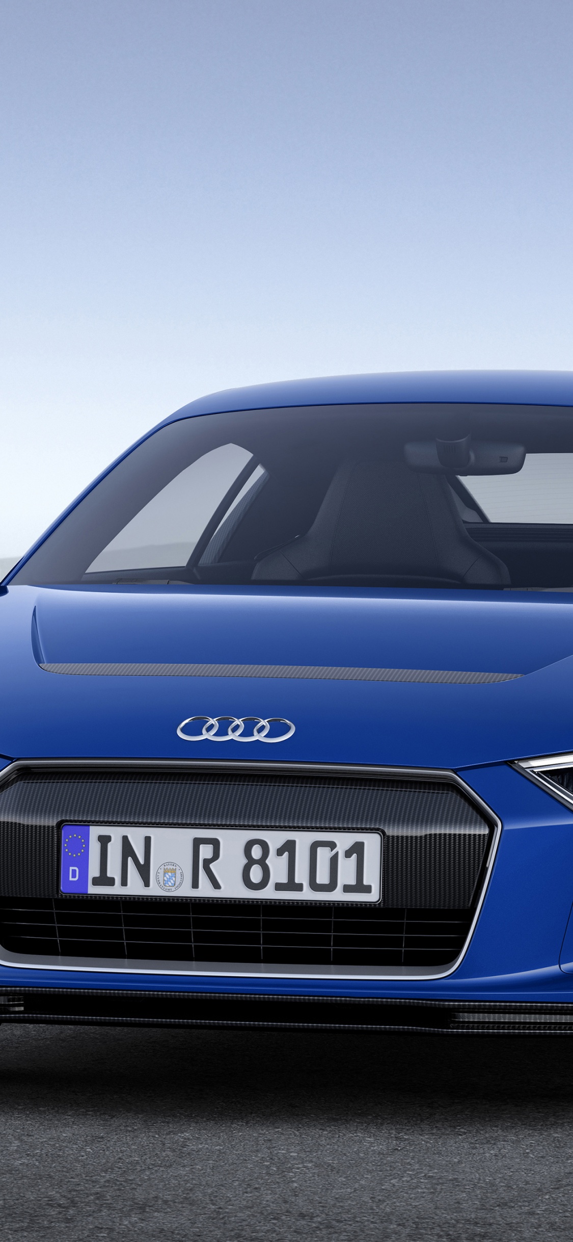 Blaue Audi r 8 Auf Grauem Hintergrund. Wallpaper in 1125x2436 Resolution