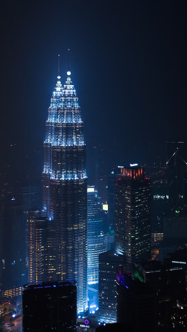 City Skyline During Night Time. Wallpaper in 720x1280 Resolution