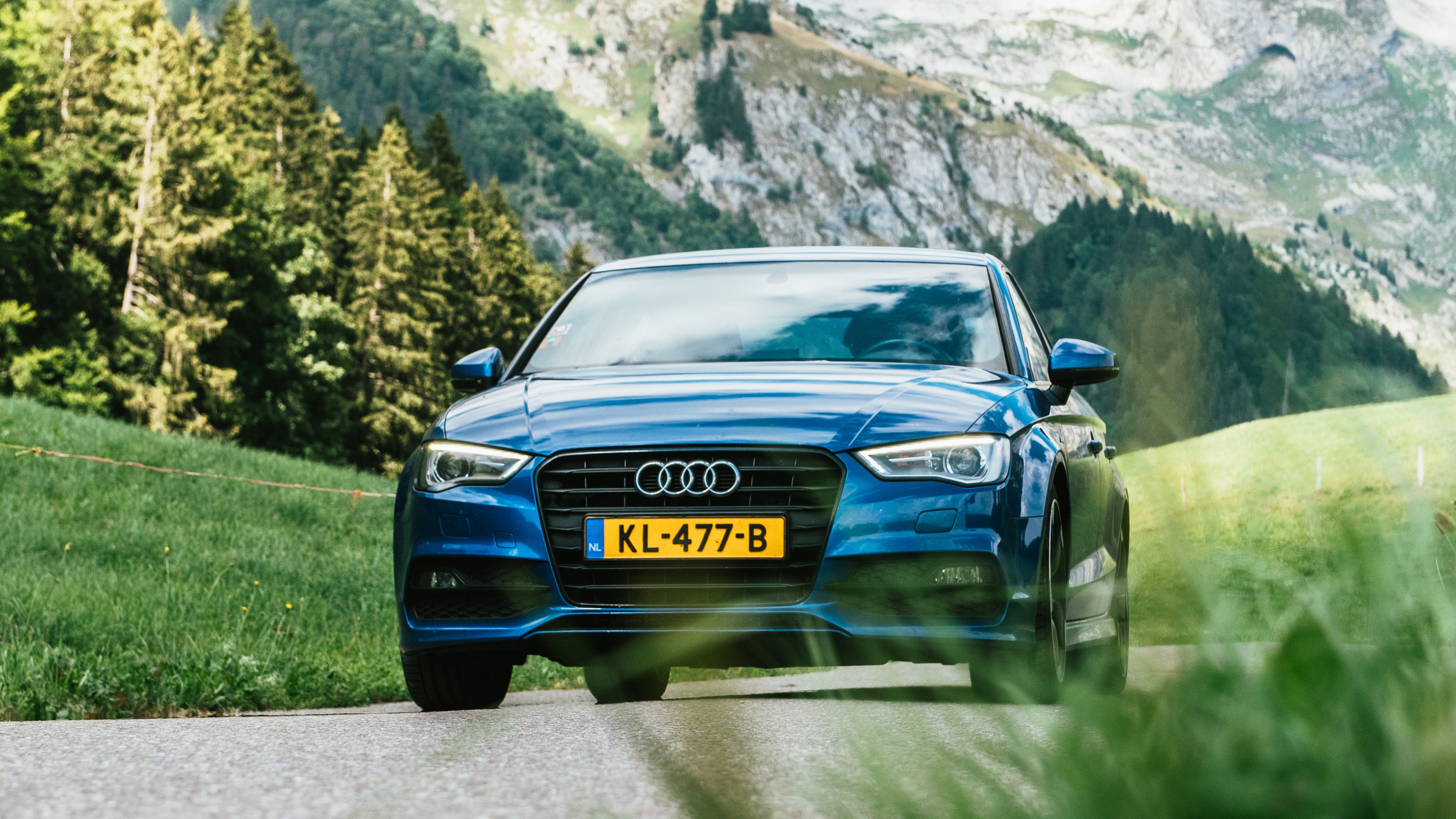 Blue Car on Road Near Green Grass Field and Trees During Daytime. Wallpaper in 3840x2160 Resolution