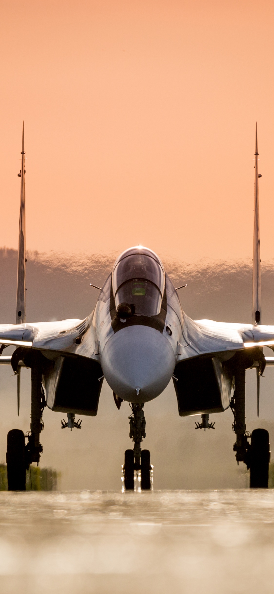 Gray Jet Plane on Gray Field During Daytime. Wallpaper in 1125x2436 Resolution