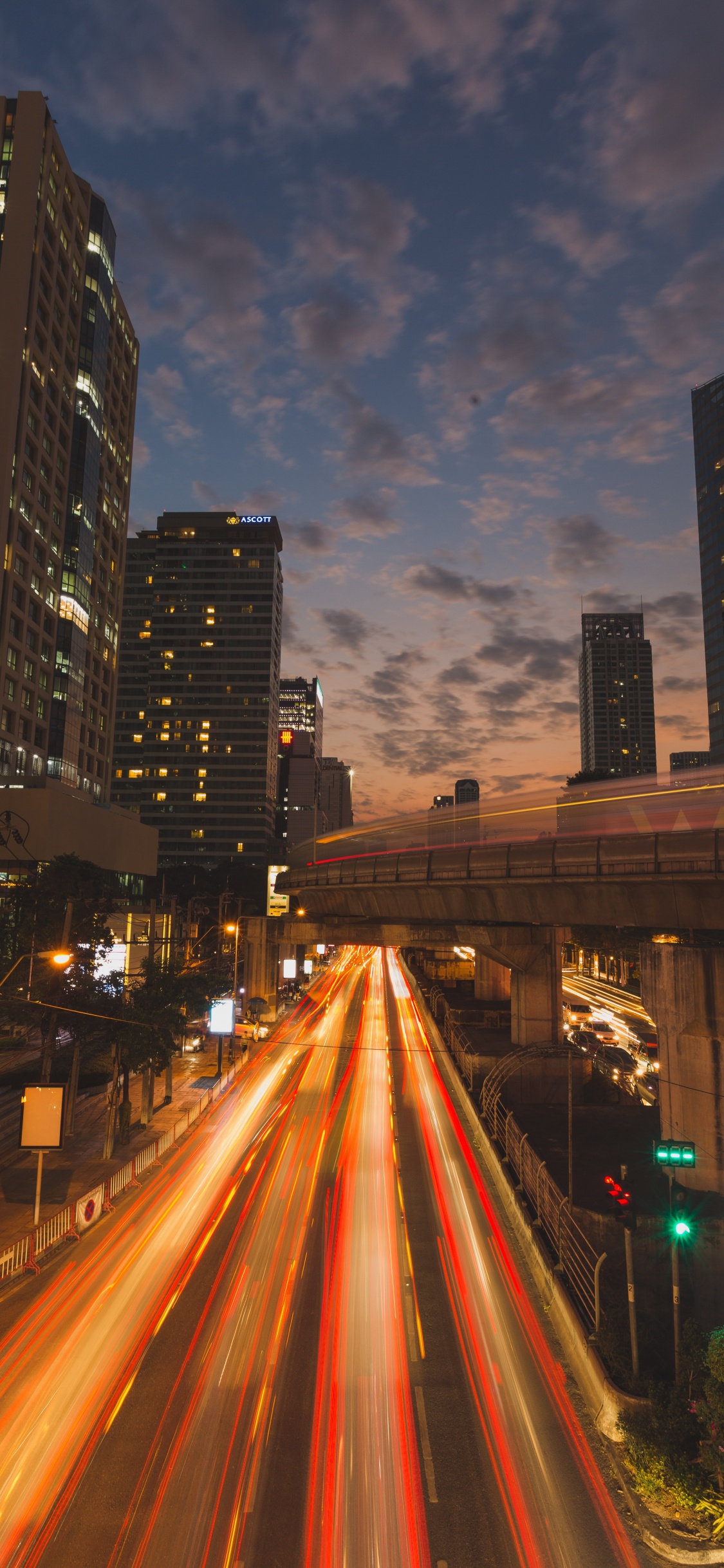 Time Lapse Photography of City During Night Time. Wallpaper in 1125x2436 Resolution