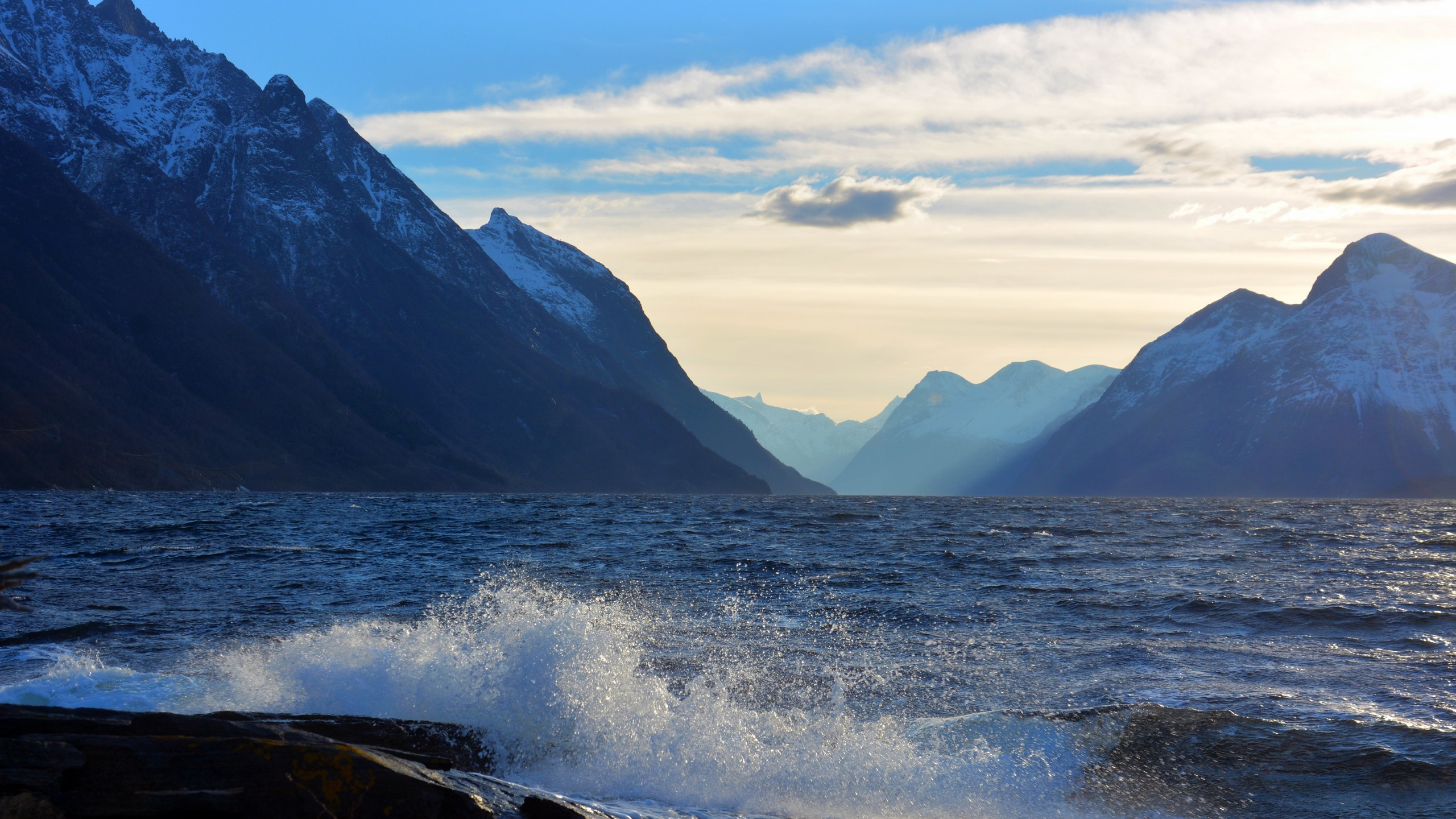 Body of Water Near Mountain Under Blue Sky During Daytime. Wallpaper in 2560x1440 Resolution