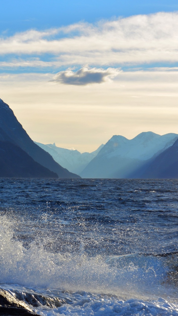 Body of Water Near Mountain Under Blue Sky During Daytime. Wallpaper in 720x1280 Resolution