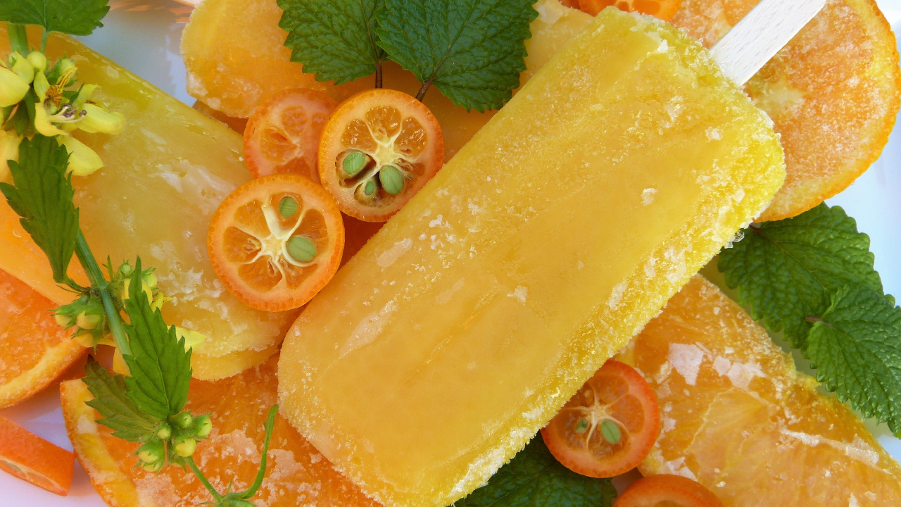 Sliced Orange Fruit on White Ceramic Plate. Wallpaper in 1280x720 Resolution