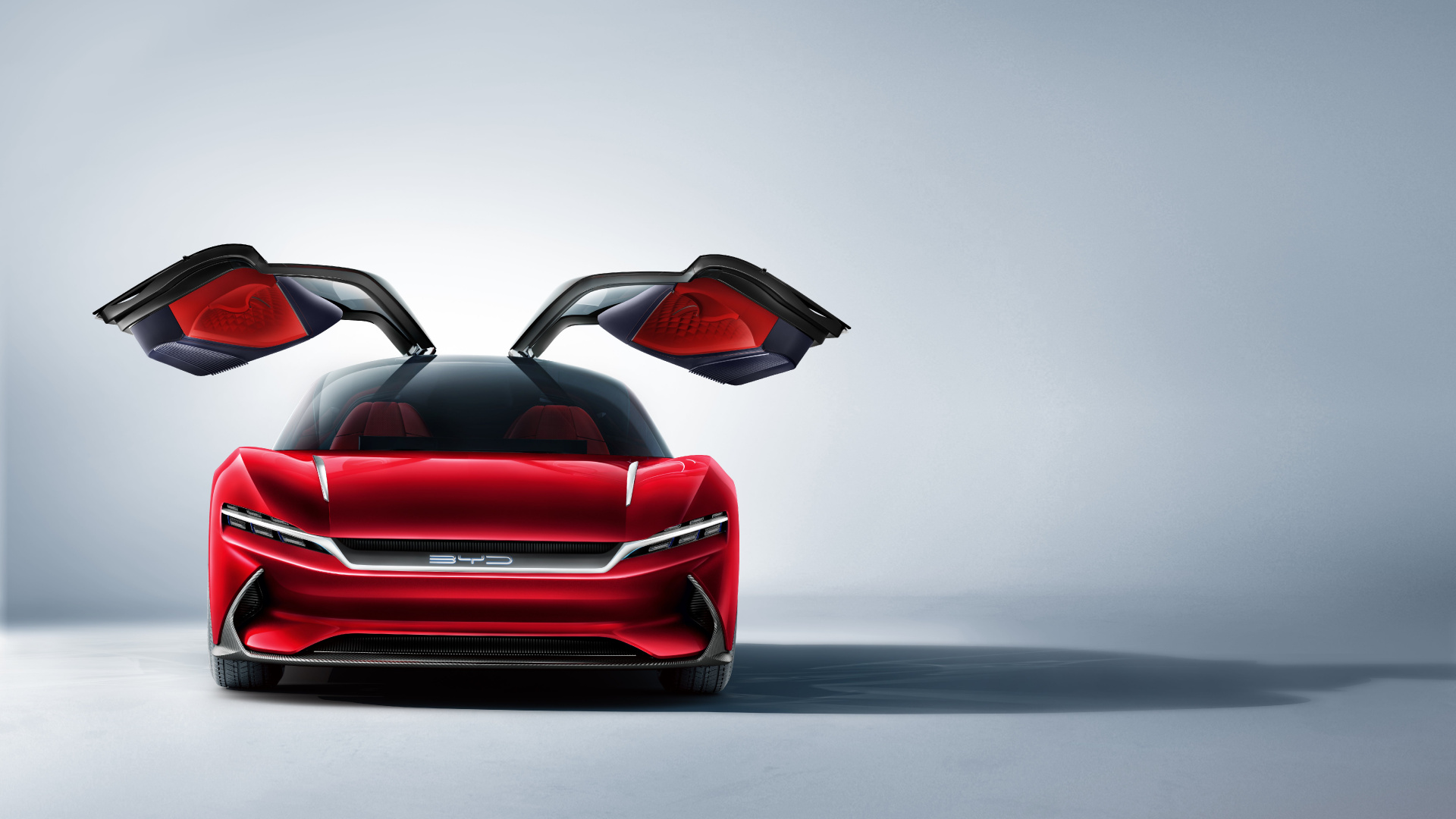 Red Ferrari Sports Car on Gray Pavement. Wallpaper in 1920x1080 Resolution