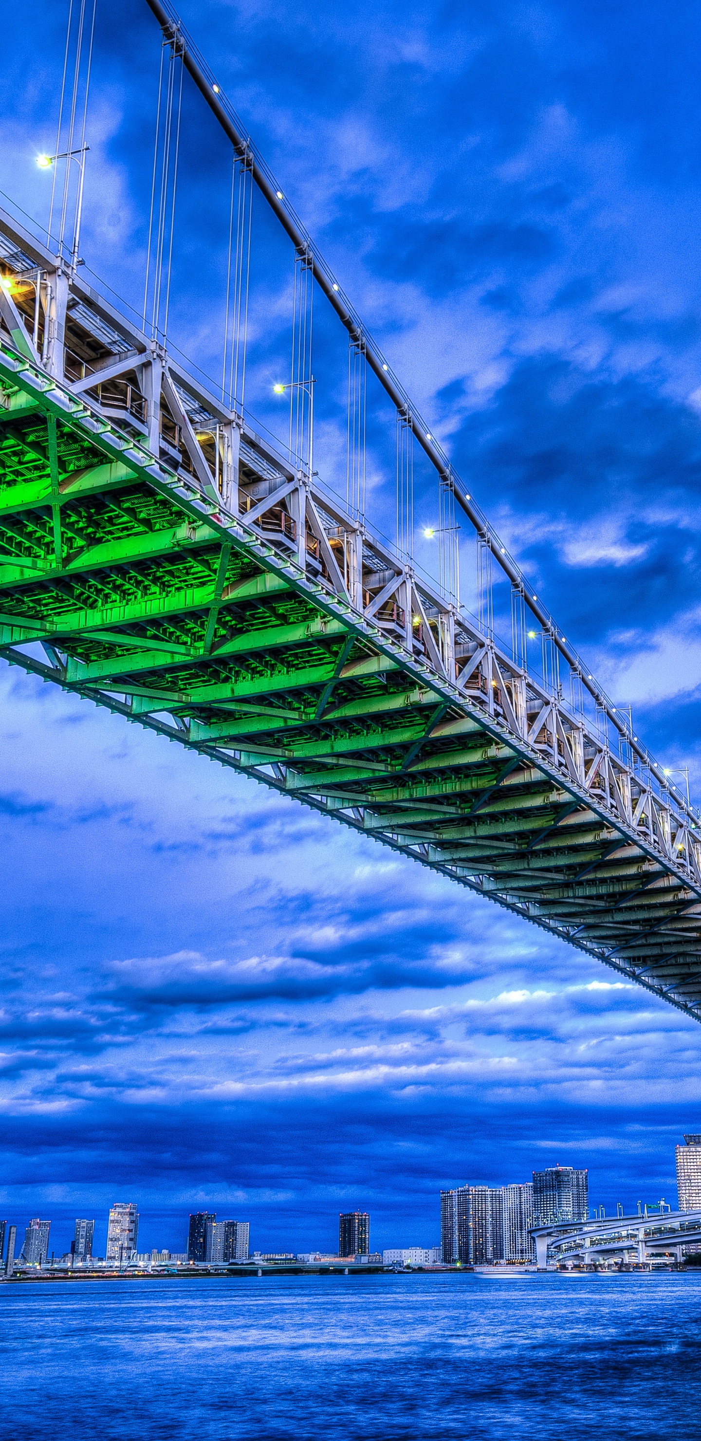 Green Bridge Under Blue Sky During Daytime. Wallpaper in 1440x2960 Resolution