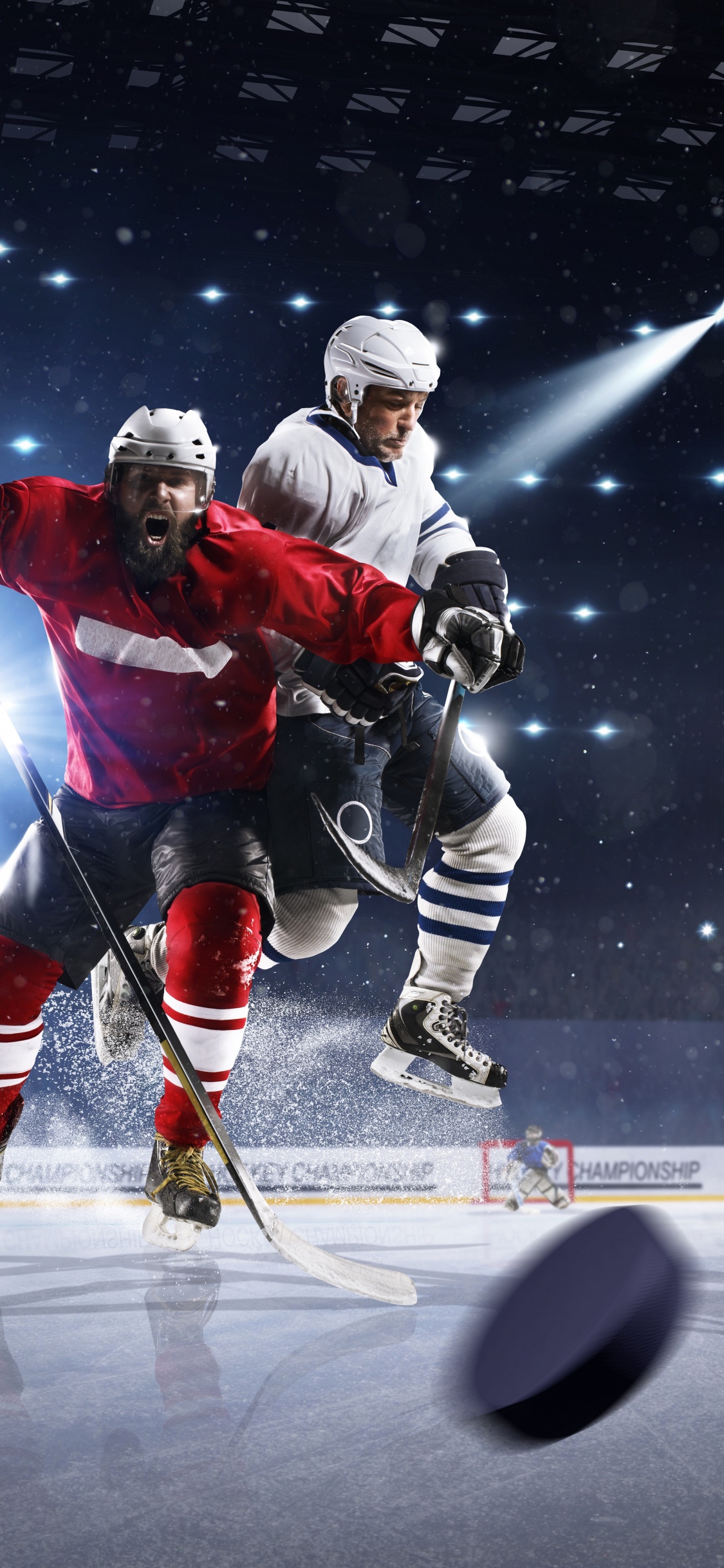 Ice Hockey Players on Ice Hockey Field. Wallpaper in 1125x2436 Resolution