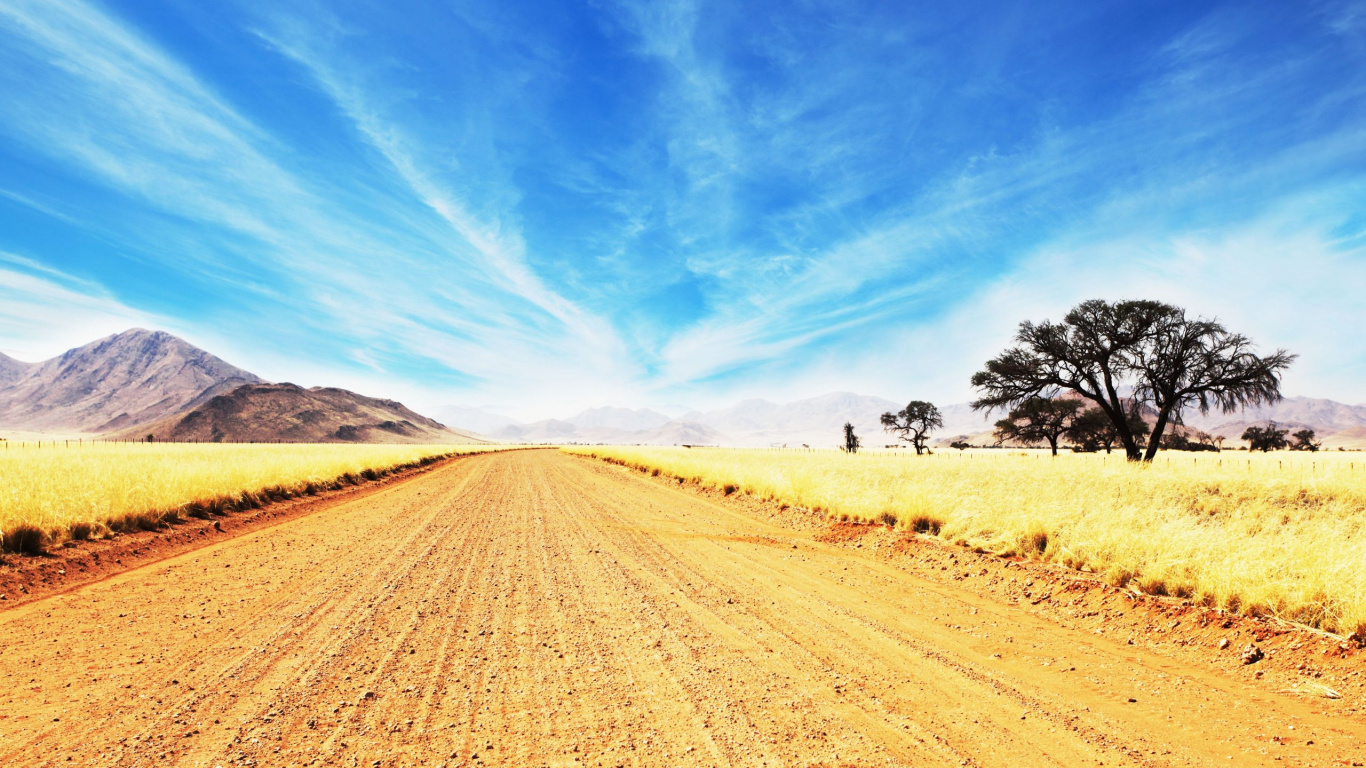 Brown Field Under Blue Sky During Daytime. Wallpaper in 1366x768 Resolution
