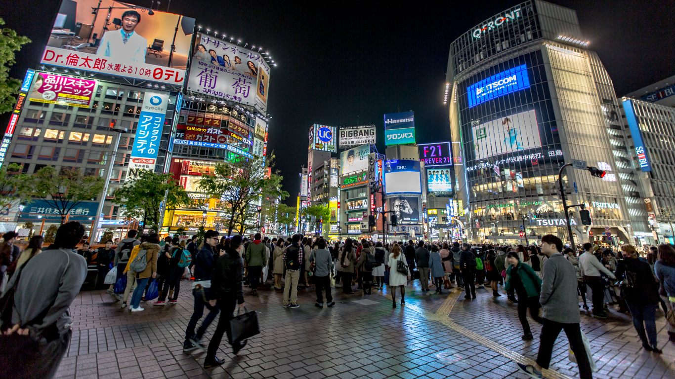 People Walking on Street During Nighttime. Wallpaper in 1366x768 Resolution