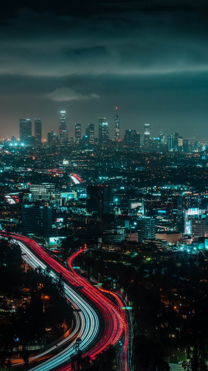 City Skyline During Night Time. Wallpaper in 720x1280 Resolution