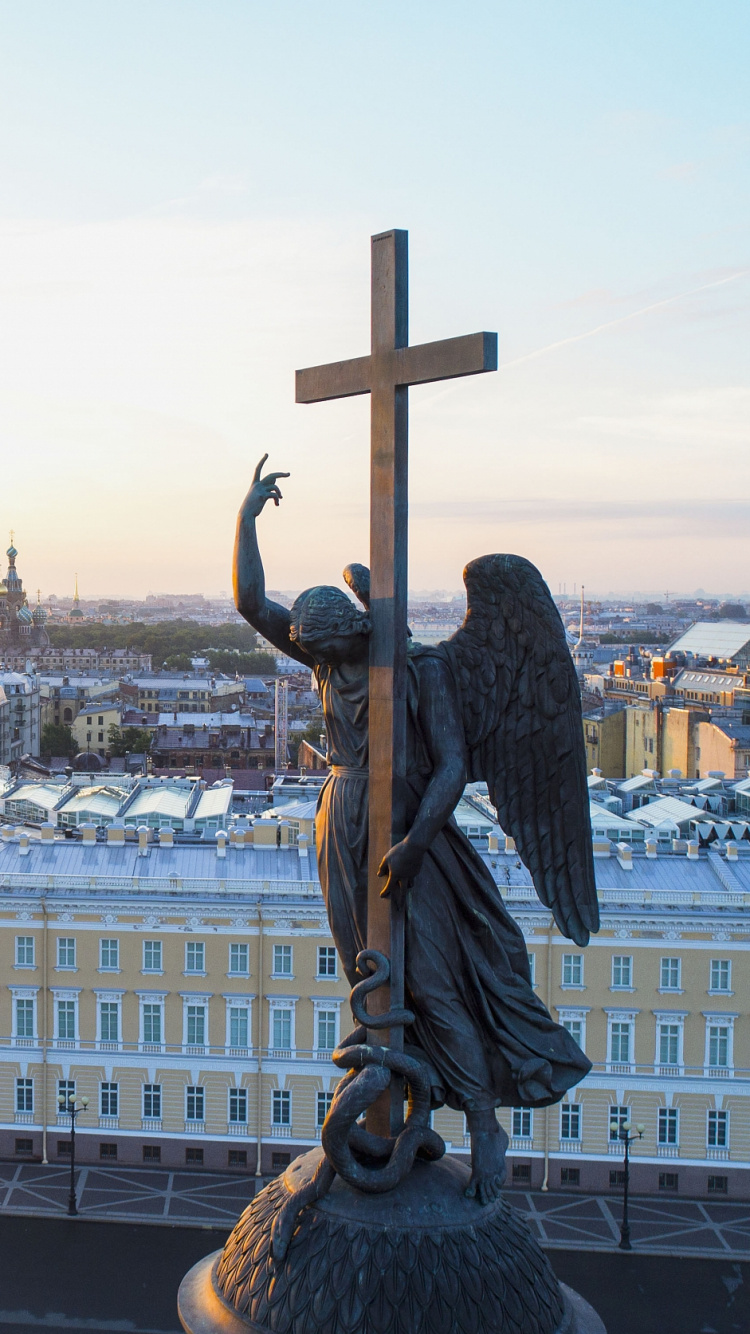 Brown Wooden Cross on Top of Building During Daytime. Wallpaper in 750x1334 Resolution