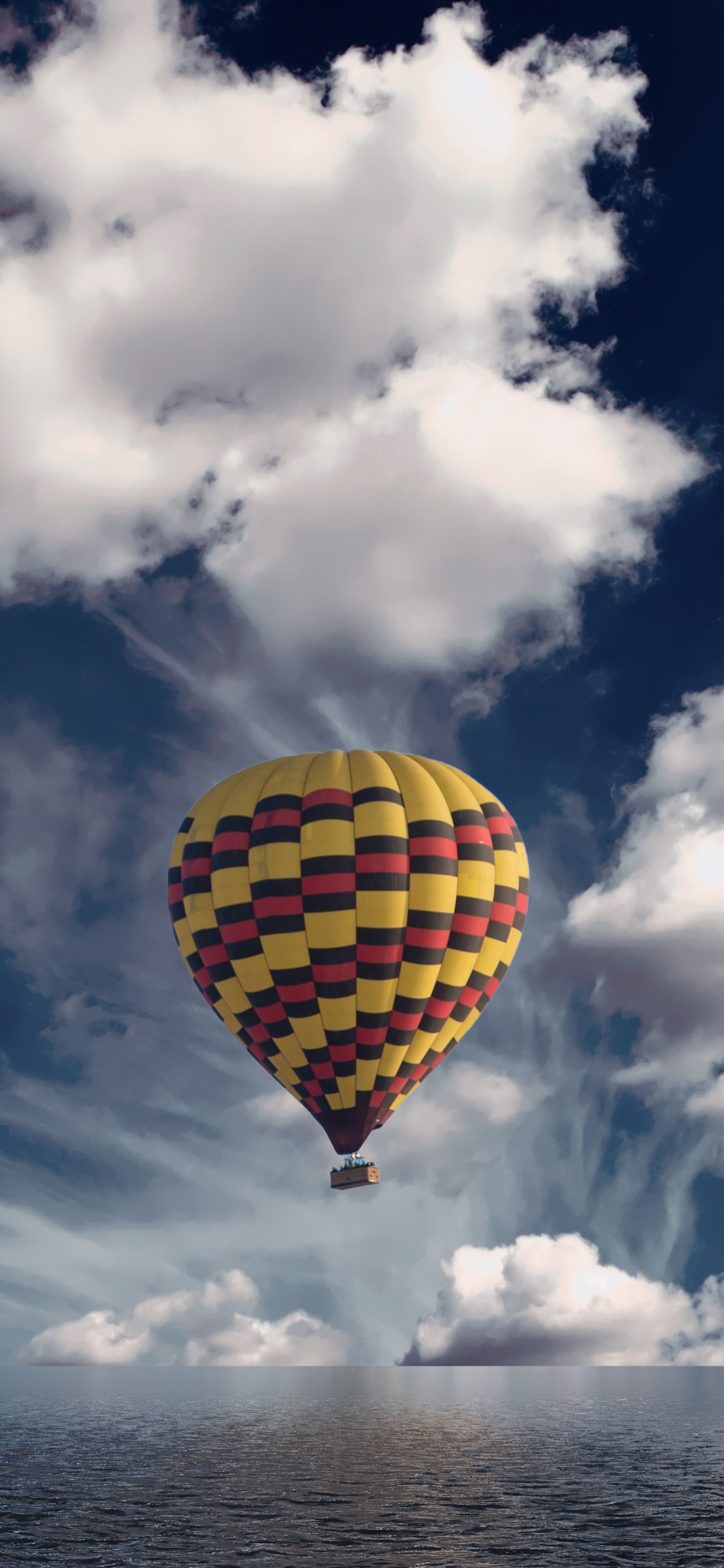 Montgolfière Jaune et Verte Dans Les Airs Sous un Ciel Nuageux Bleu et Blanc Pendant. Wallpaper in 1242x2688 Resolution