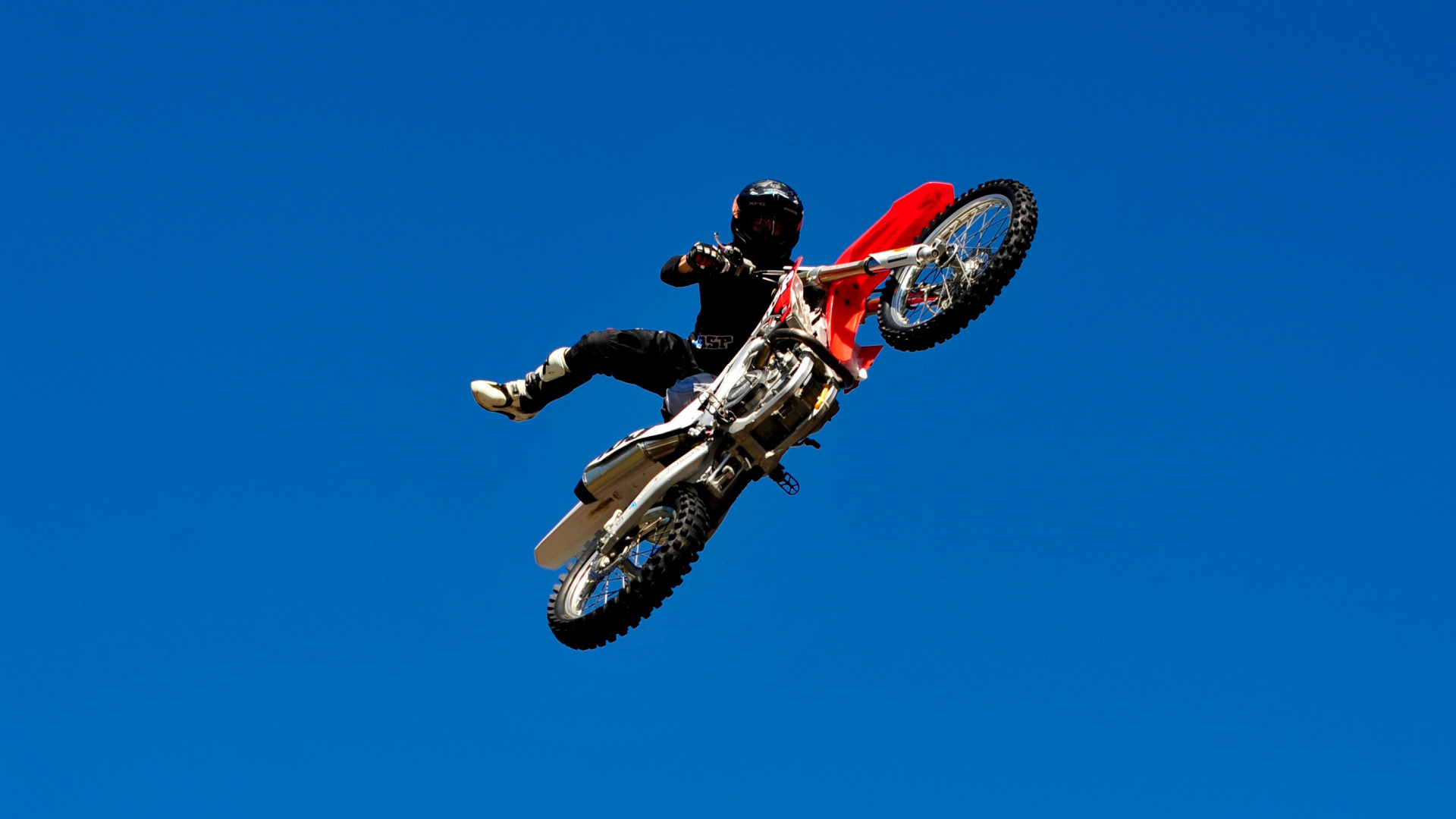 Homme en Costume de Motocross Rouge et Noir Équitation Motocross Rouge et Blanc. Wallpaper in 1920x1080 Resolution