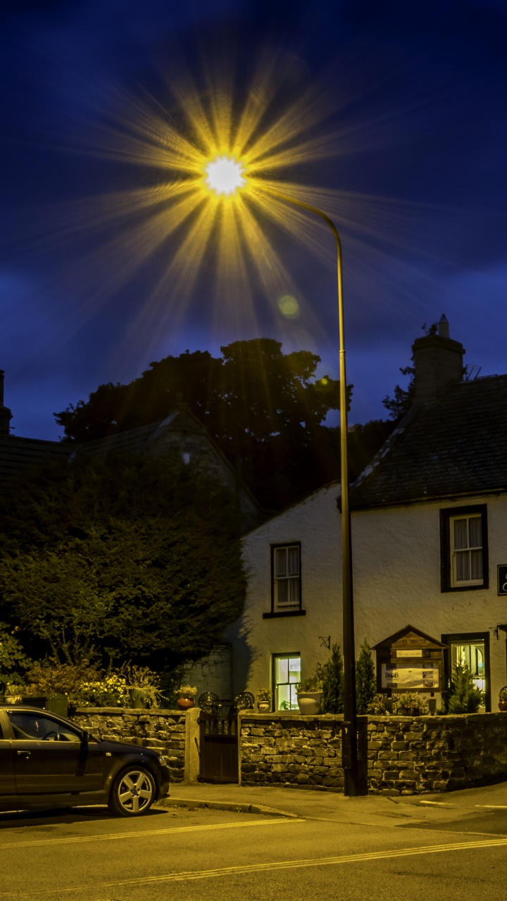 White and Brown Concrete House Near Gray Suv During Daytime. Wallpaper in 720x1280 Resolution