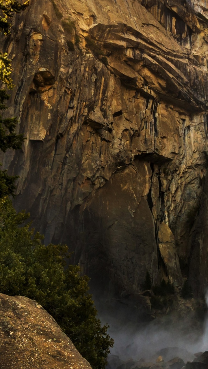 Waterfalls in Brown Rocky Mountain During Daytime. Wallpaper in 720x1280 Resolution