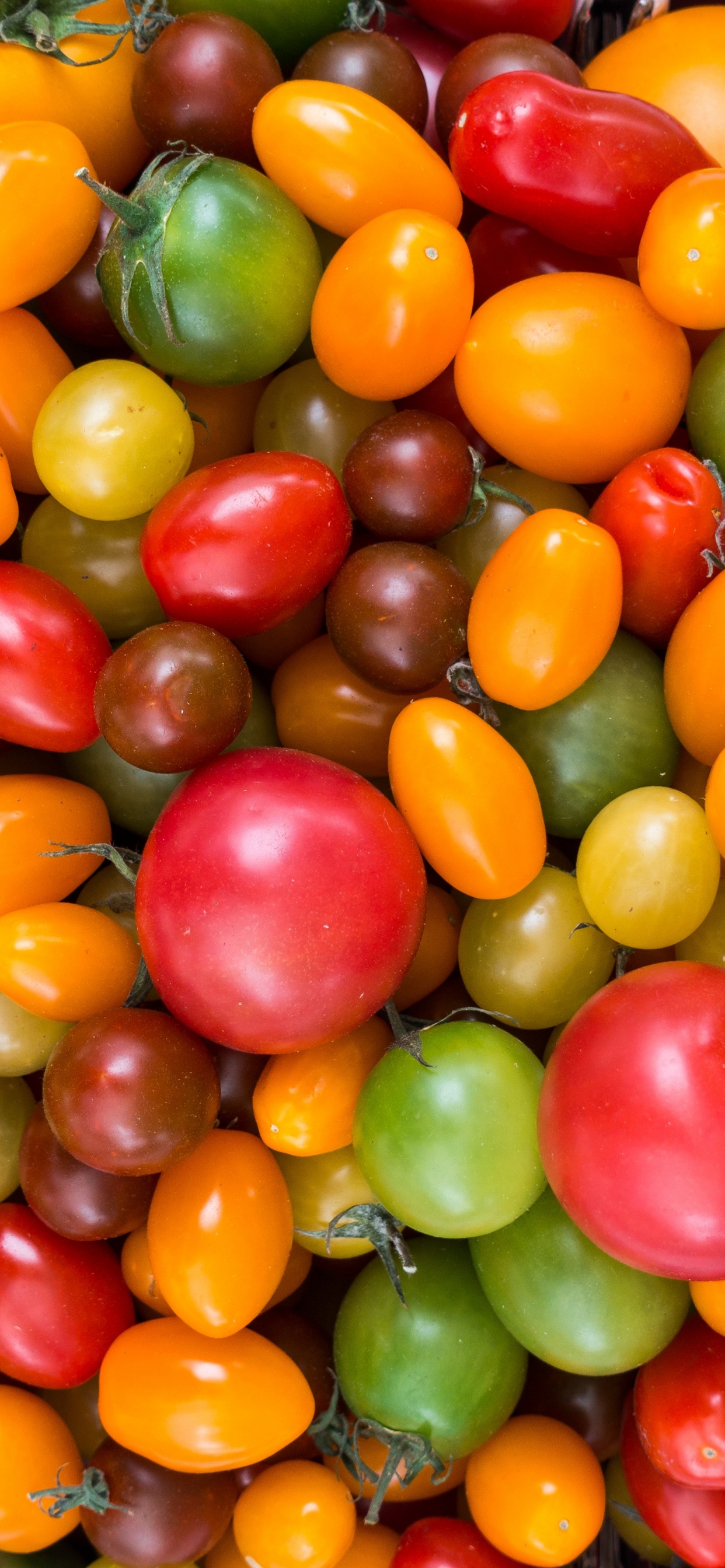Green and Red Round Fruits. Wallpaper in 1242x2688 Resolution