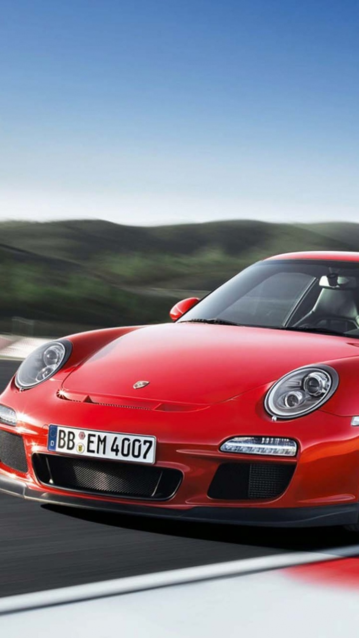 Red Porsche 911 on Road During Daytime. Wallpaper in 720x1280 Resolution