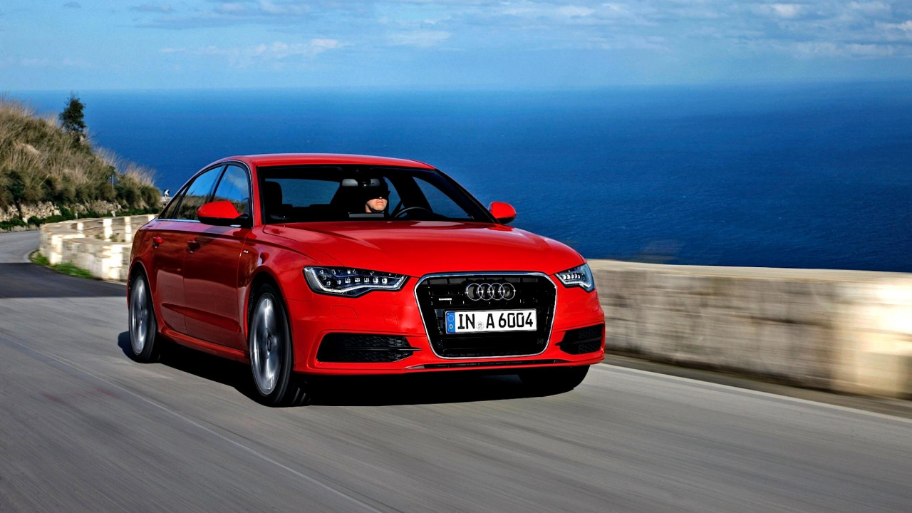 Red Audi r 8 on Road During Daytime. Wallpaper in 1280x720 Resolution