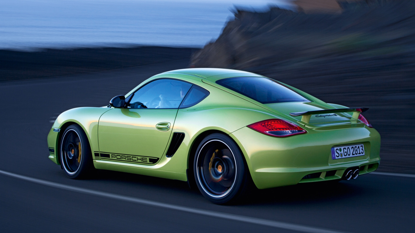 Grüner Porsche 911 Tagsüber Unterwegs. Wallpaper in 1366x768 Resolution