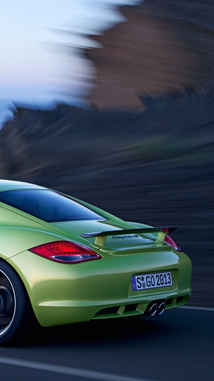 Green Porsche 911 on Road During Daytime. Wallpaper in 720x1280 Resolution