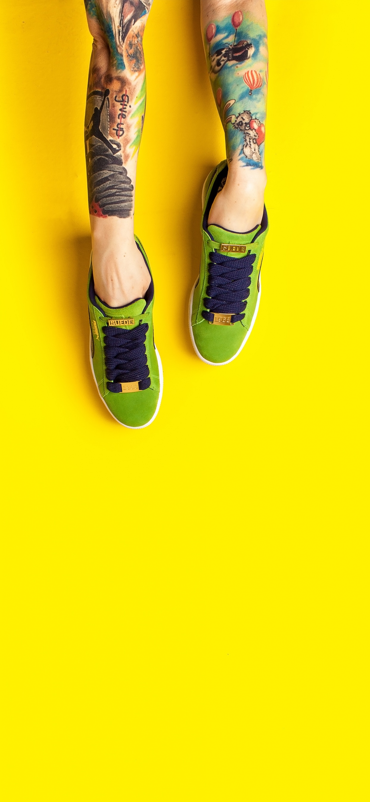 Person in Blue Denim Jeans and Black and White Sneakers. Wallpaper in 1242x2688 Resolution