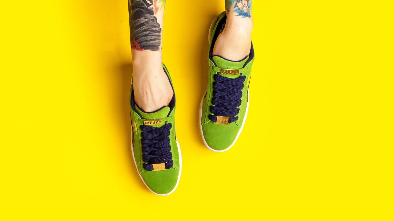 Person in Blue Denim Jeans and Black and White Sneakers. Wallpaper in 1280x720 Resolution