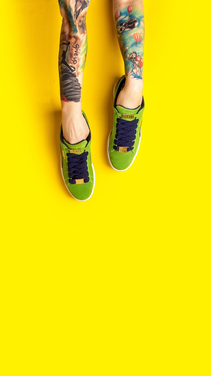 Person in Blue Denim Jeans and Black and White Sneakers. Wallpaper in 720x1280 Resolution