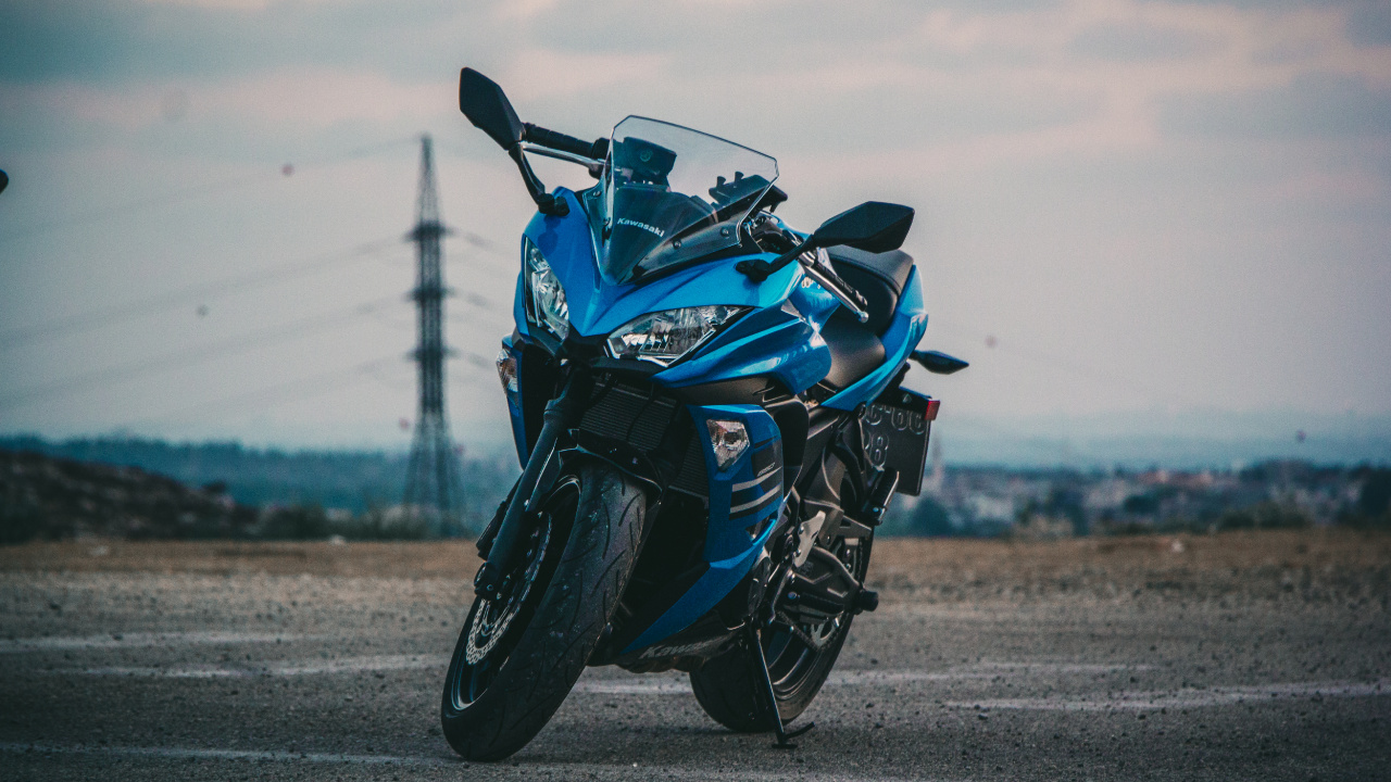 Blue and Black Sports Bike on Gray Asphalt Road During Daytime. Wallpaper in 1280x720 Resolution