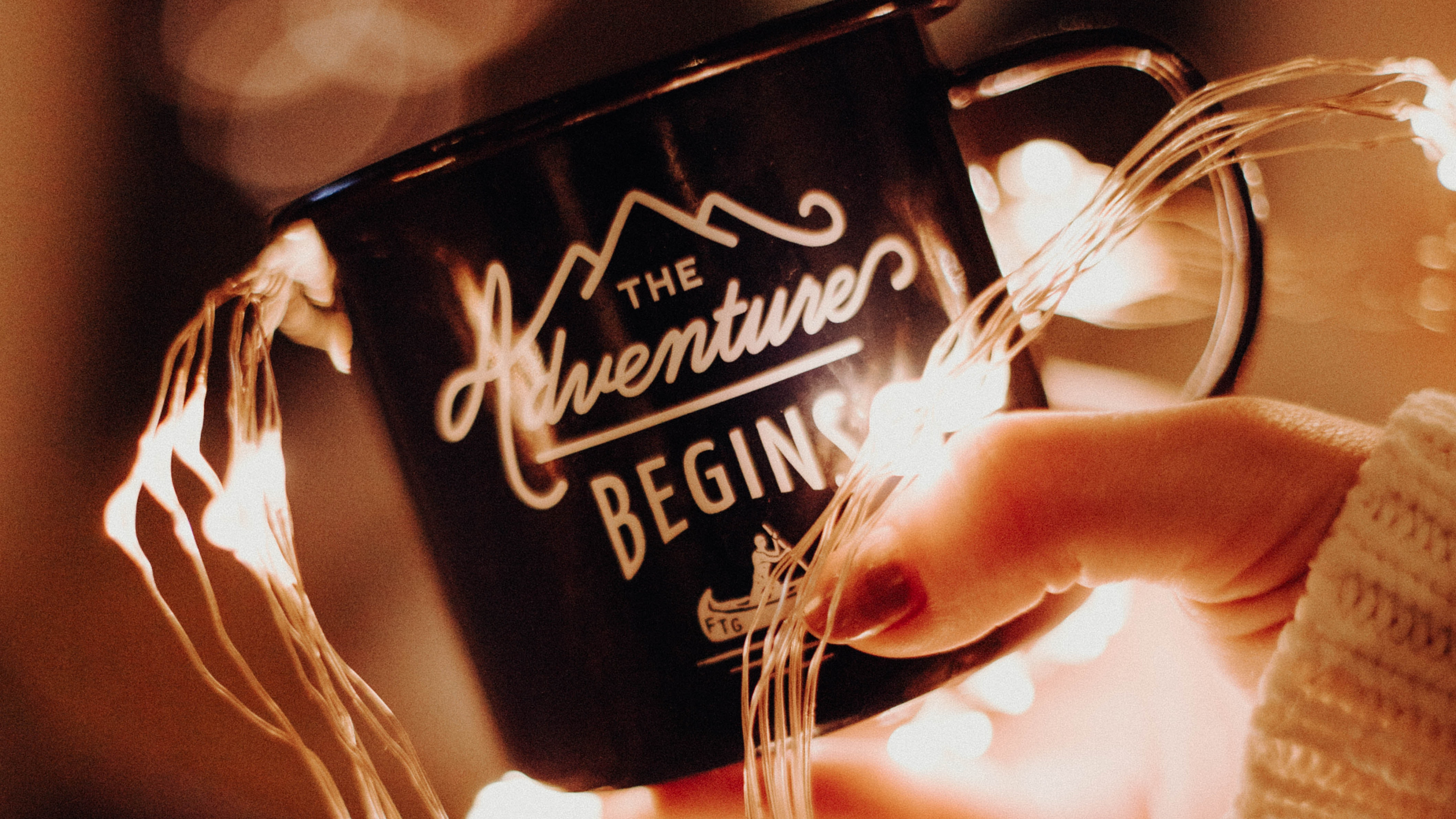 Person Holding Black and White Ceramic Mug. Wallpaper in 3840x2160 Resolution