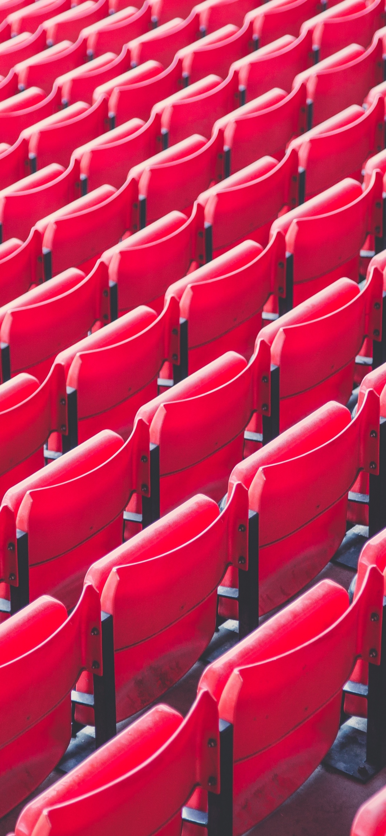 Sillas de Plástico Rojo en el Estadio. Wallpaper in 1242x2688 Resolution