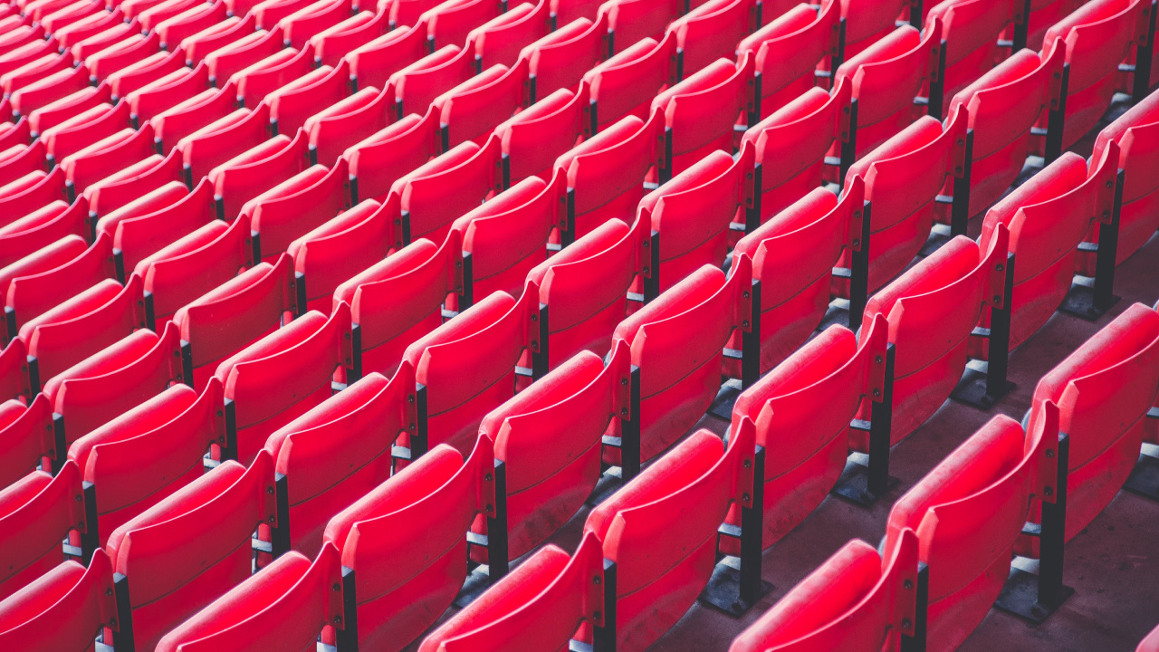 Red Plastic Chairs in Stadium. Wallpaper in 1280x720 Resolution