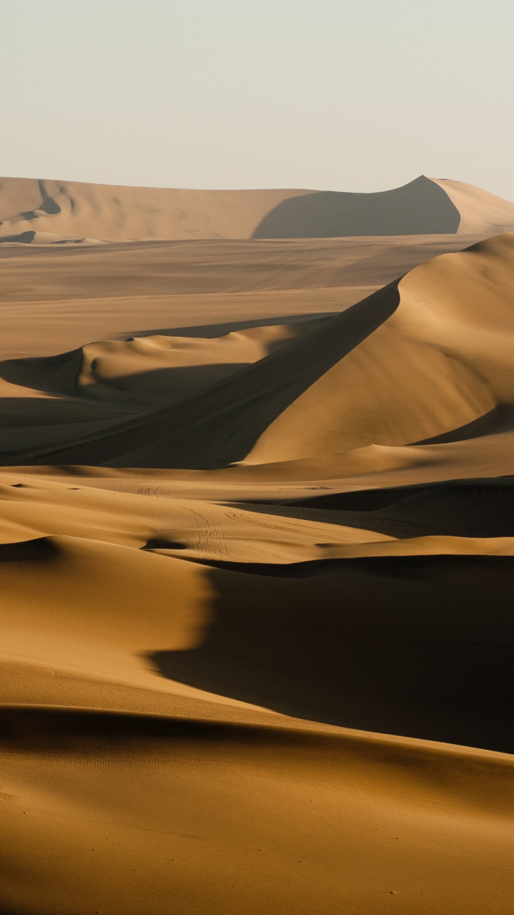 Brown Sand Dunes During Daytime. Wallpaper in 750x1334 Resolution