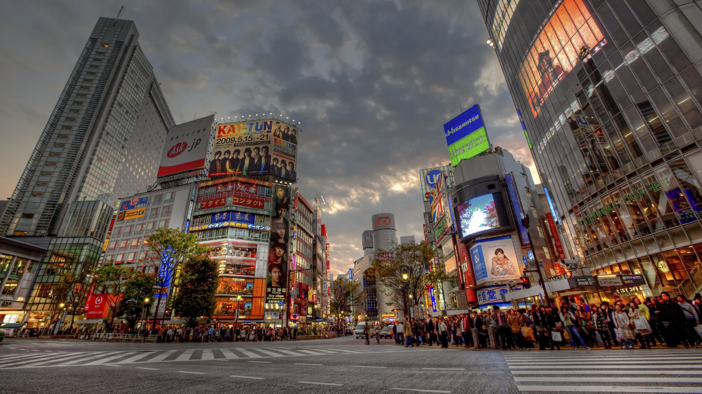 City Buildings Under Gray Cloudy Sky During Daytime. Wallpaper in 1366x768 Resolution